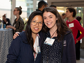 Discovery Fellows Inez Raharjo and Olivia Creasey pose for a photo at fall reception