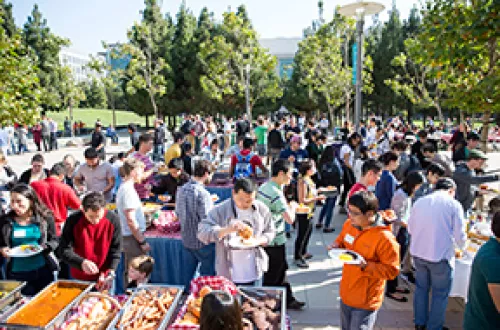 View of crowd on Koret Quad for Graduate Division Fall Celebration