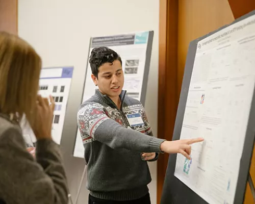 Jesus Madrigal presents his poster
