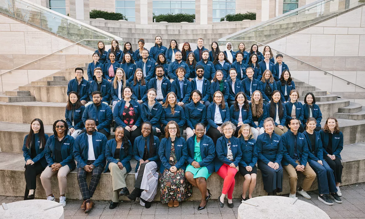 71 UCSF PhD candidates pose for a photo outside Genentech Hall
