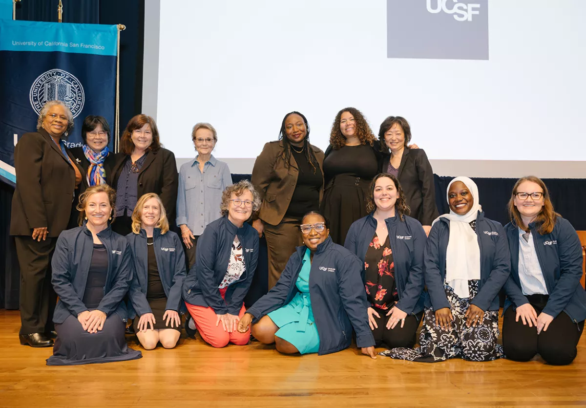 students and faculty from nursing and sociology programs pose together