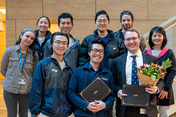 awardees and colleagues gather for a photo