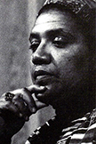 Black and white close-up photo of Audre Lorde
