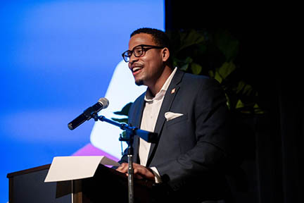 Jayson Davidson speaks at podium upon accepting the 2023 Chancellor Award for Dr. Martin Luther King, Jr. Leadership on October 24