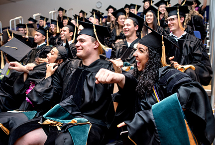 Physical Therapy grads gather for a group photo in Robertson Auditorium